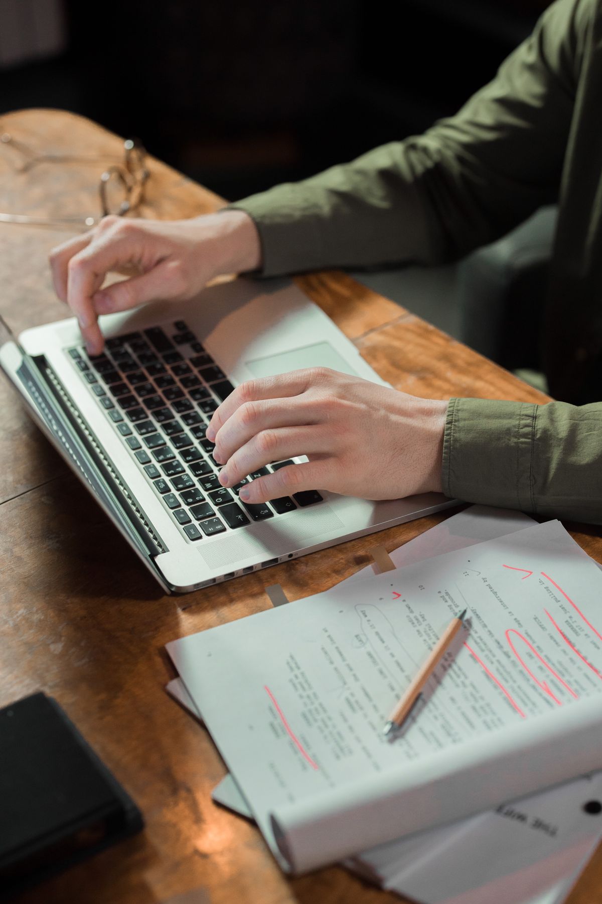 A writer shaping ideas at a laptop